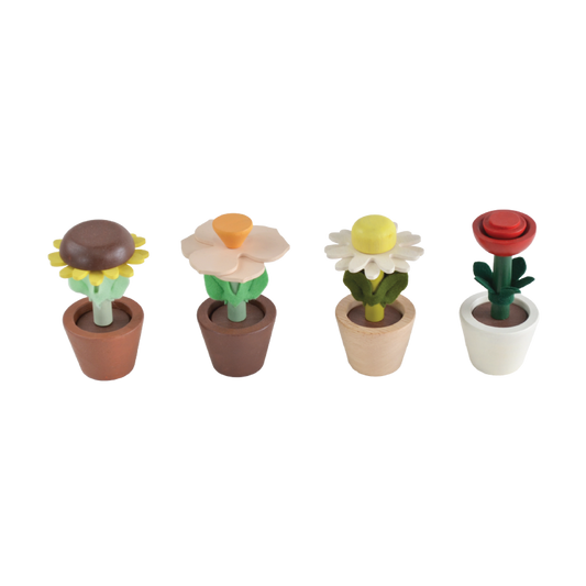 A set of four toy flower pots in different colors representing sunflower, daisy, rose, and cherry blossom, with detachable parts.