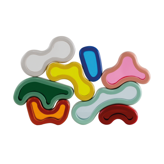 A set of colorful organic shaped acrylic blocks in various colors stacked together.