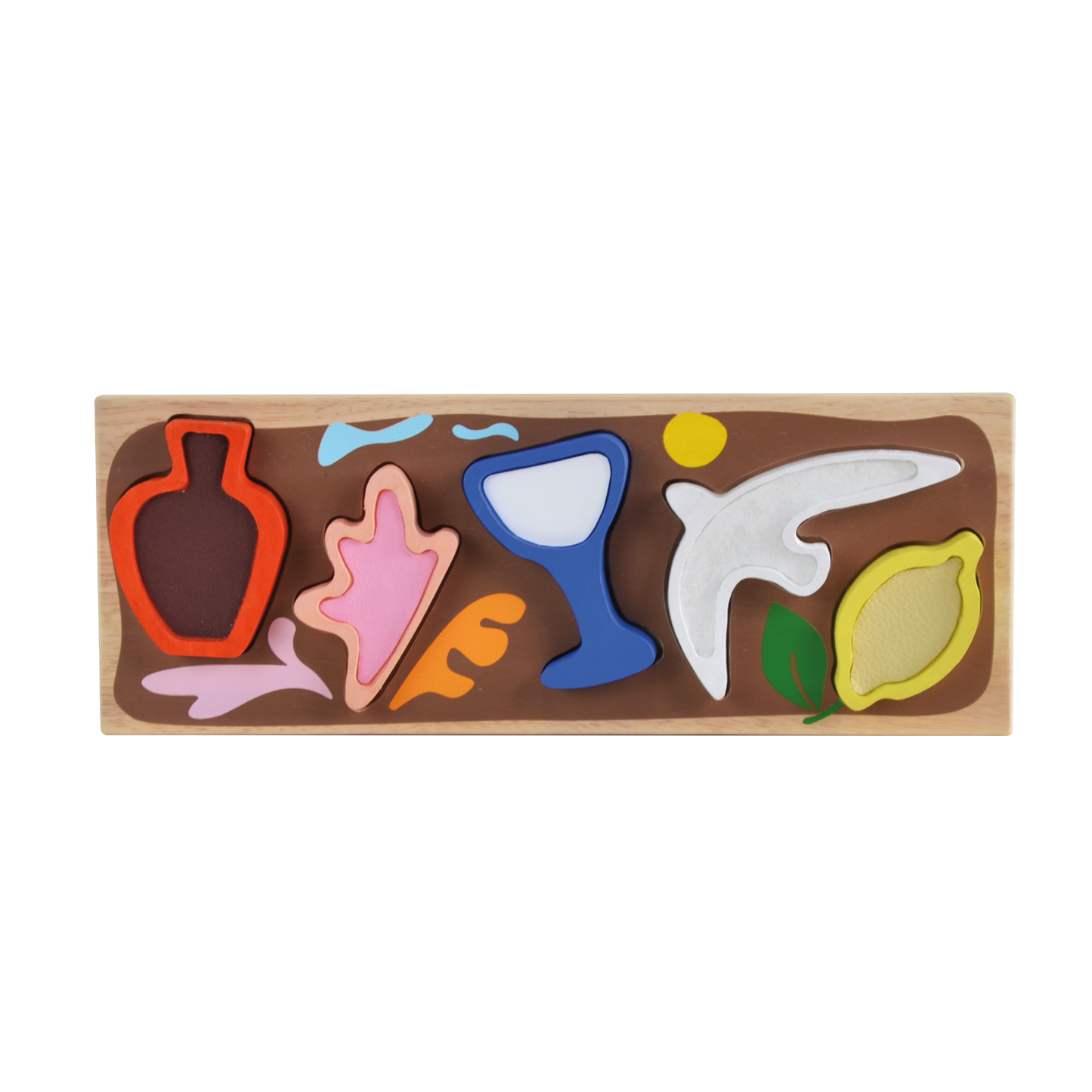 Wooden sensory puzzle with textured and shaped pieces that match illustrated slots on a tray, inspired by modernist art from the French Riviera.