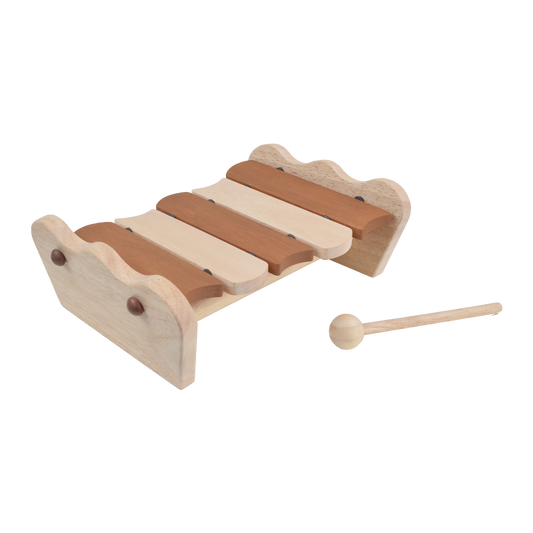 A wooden scallop xylophone with five bars and a beige mallet.