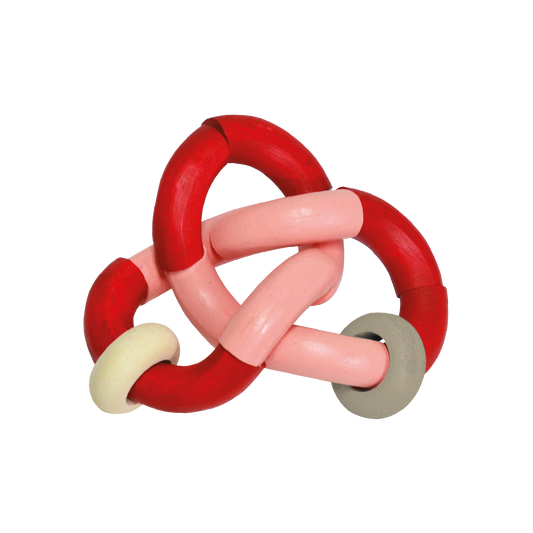 A colorful bendy rattle toy with red, pink, and white parts connected by knots.