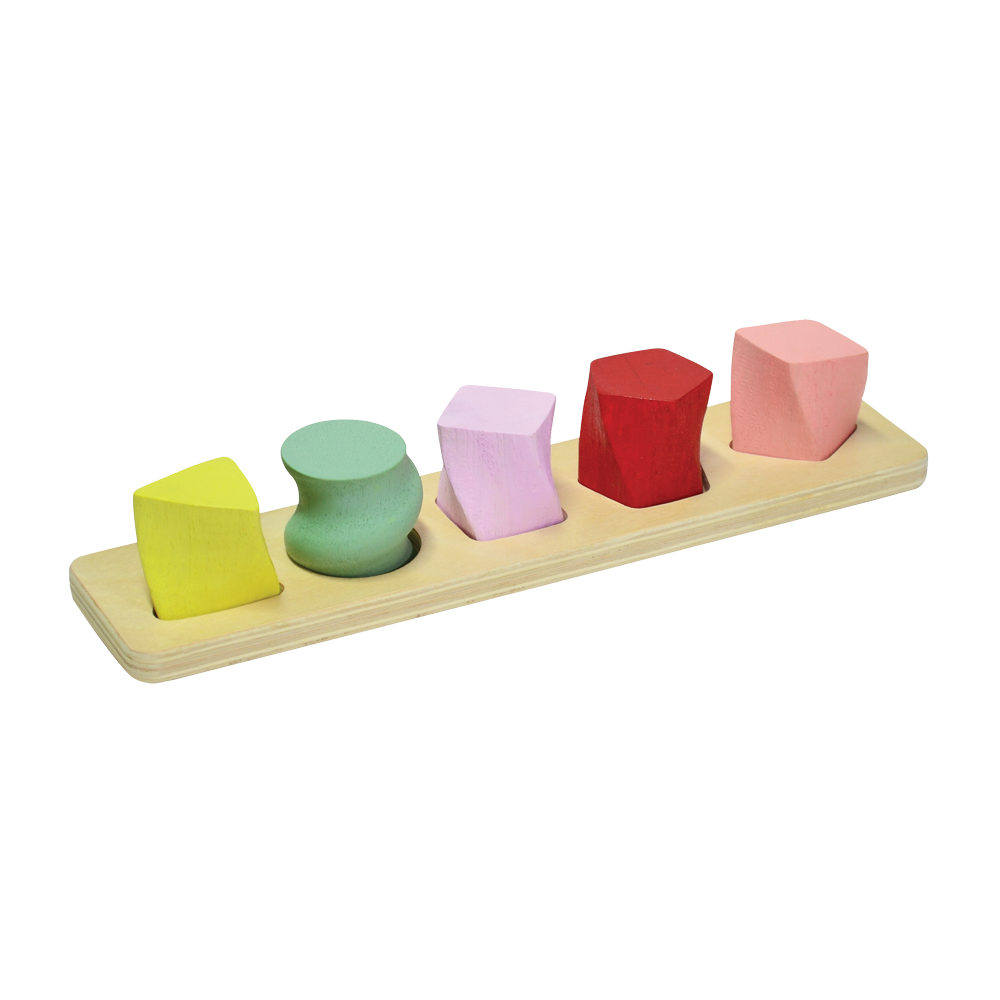A set of colorful geometric shape sorters on a wooden board. The sorters are in shapes of a sphere, cube, cylinder, cone, and rectangular prism, each a different color.