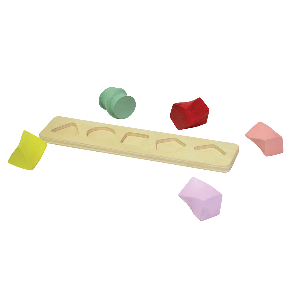 A set of colorful geometric shape sorters on a wooden board. The sorters are in shapes of a sphere, cube, cylinder, cone, and rectangular prism, each a different color.